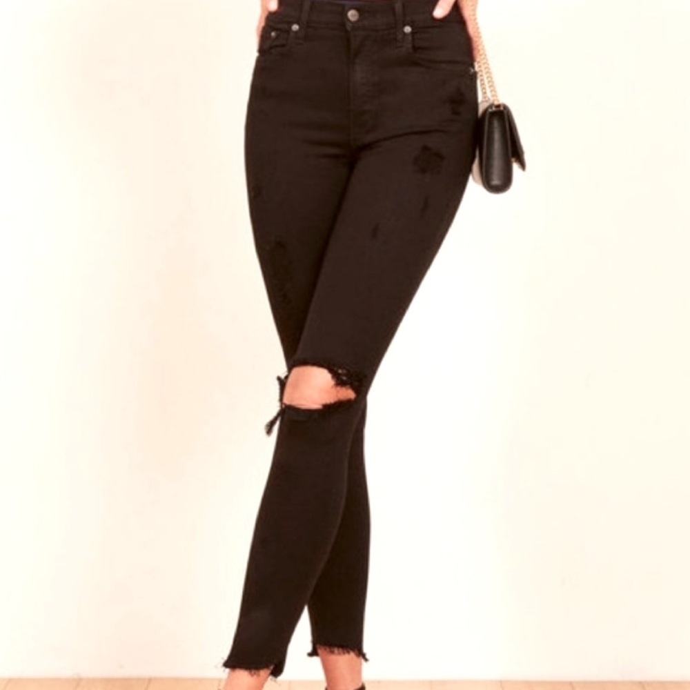 Reformation High Rise distressed Black Jeans with Frayed hem in a Size 27.